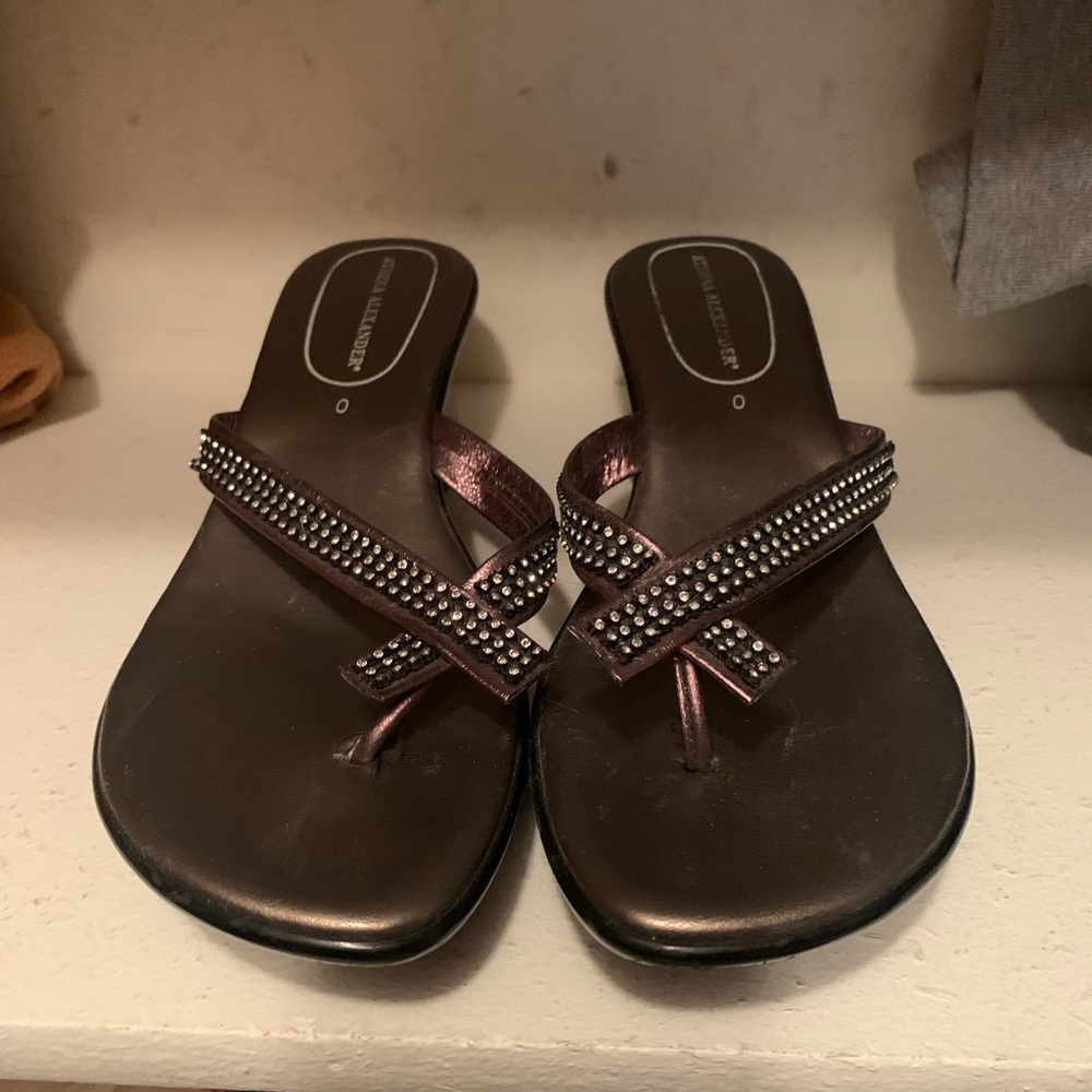 Gently worn bronze colored and jeweled sandals. Size 9